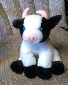 Stuffed cow with blue eyes