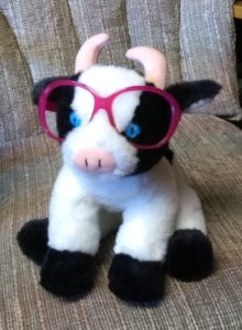 Stuffed cow with glasses